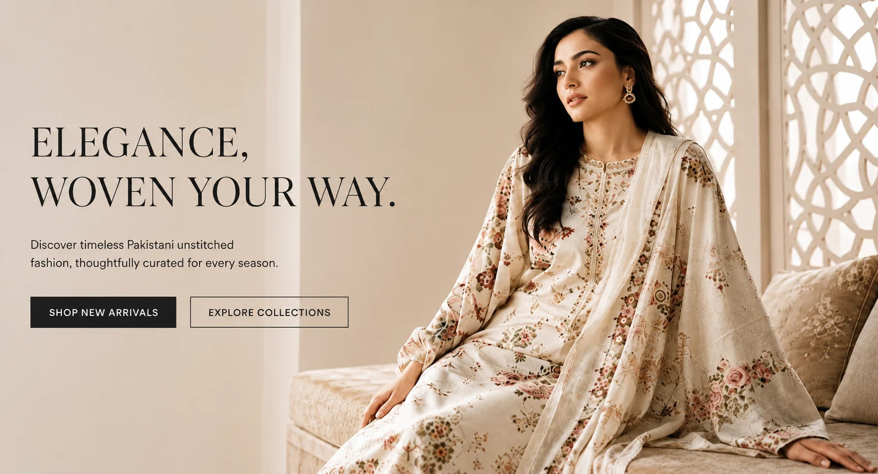 A woman models a traditional embroidered outfit with a beige dupatta featuring floral patterns, seated on a sofa in a warm, elegant interior. Text on the left reads 'ELEGANCE, WOVEN YOUR WAY.
